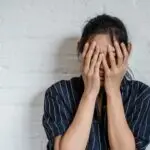 Christian man or woman seeking God's forgiveness for sexual addiction.